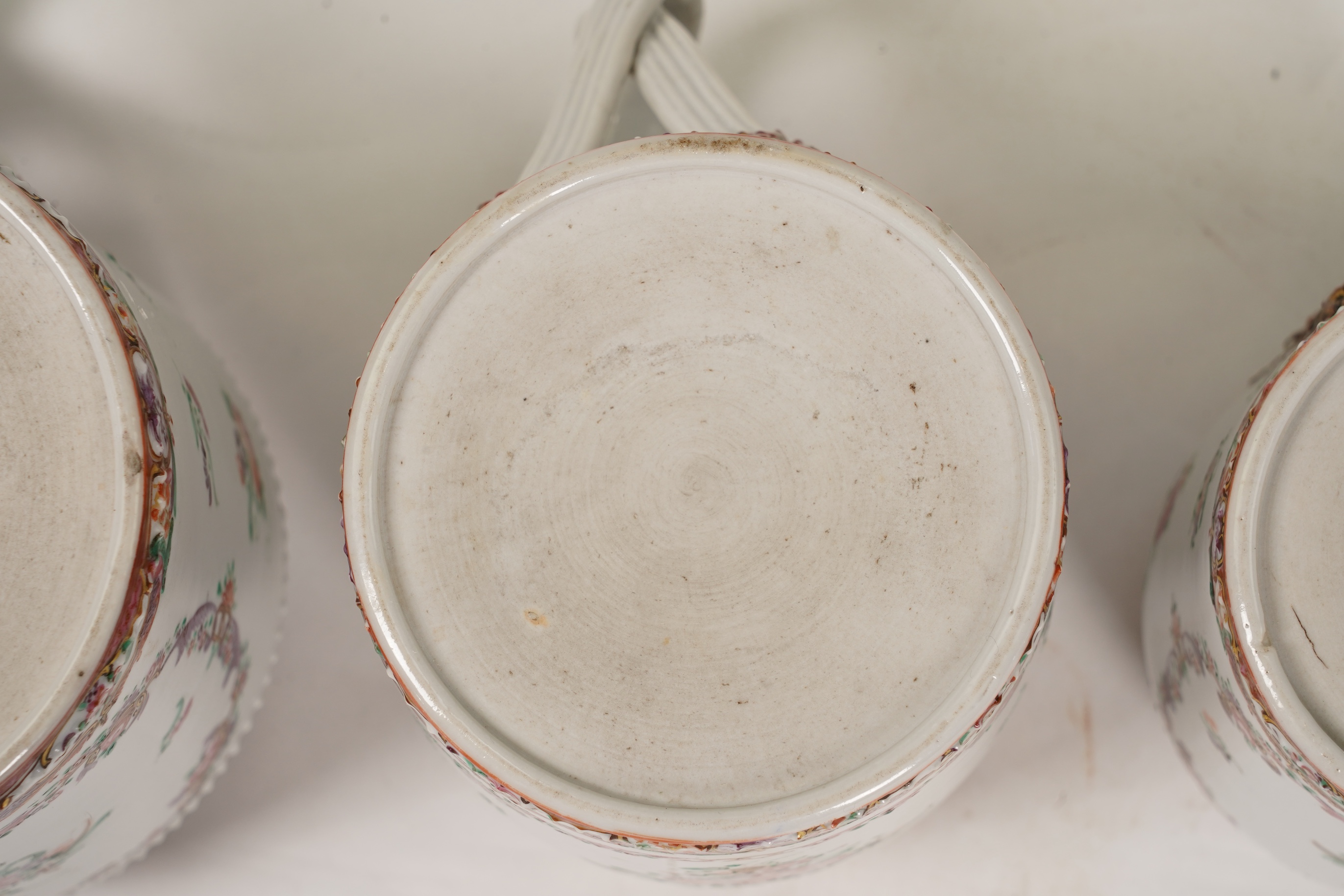 A graduated set of three Chinese export famille rose mugs, Qianlong period